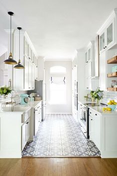 the kitchen is clean and ready for us to use it's counters, cabinets, and drawers