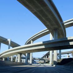 an overpass on the side of a highway