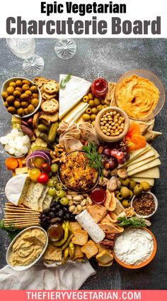 a table topped with lots of different types of meats and cheese on top of it