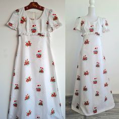 "Very beautiful vintage maxi dress from \"Vera Mont Paris\", maxi dress with pure-white colour and red flower print. Perfect for special ocassion (i.e. wedding/ bridesmaid/ engagement/ birthday/ party).  Inside is fully lined. No stain, no damage, perfect vintage condition.  This item has been washed and steamed, therefore there is no weird smell and free of stain.  Washing advice: Washing machine is possible, with handwash menu. MEASUREMENT Armpit to armpit: 43 cm Waist: 39 cm Length: 147 cm Advice for S (please read my note below). MEASUREMENT Keep in mind, that US letter sizing (S/M/L/XL) is just our best estimate based on the mannequin. In reality, it can be differ due to bra-cup sizes and waist sizes. So, we strongly suggest to measure similar items from your wardrobe: lying flat. Ple Engagement Party Vintage, Vintage White Dress, Red Flower Print, White Vintage Dress, 70s Maxi Dress, Bra Cup Sizes, Vintage Maxi Dress, Wedding Bridesmaid, White Colour