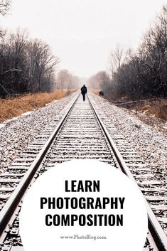 a person walking down train tracks with the words learn photography composition overlayed on top