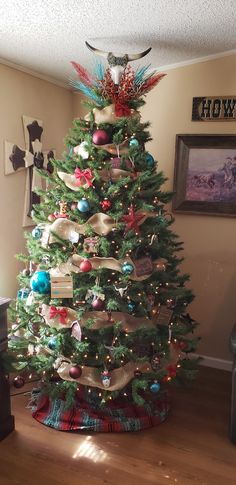 a decorated christmas tree in a living room