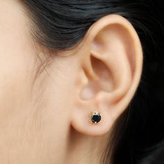 Product Details Elevate your style with these cute kitty stud earrings, featuring a radiant round lab-created black diamond set in a prong setting at the center. The solid gold metal adds a playful cat-inspired touch, while the screw back ensures a comfortable fit. This lab-created black diamond earring is the must-have accessory for every womens wardrobe. Product Information SKU SHP-EARRINGS112027543 Length 4.5 mm Width 5 mm Weight 0.80 gm (Approximate) LAB CREATED BLACK DIAMOND INFORMATION No. Cat Stud Earrings, Womens Wardrobe, Black Diamond Solitaire, Black Diamond Earrings, Cat Earrings Studs, Diamond Earring, Cute Kitty, Signature Jewelry, Timeless Jewelry