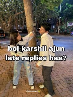 two people standing next to each other near a tree with the caption bol karshi ajun late repiles haa?