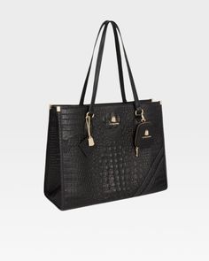 This versatile black faux crocodile skin tote bag, crafted from durable materials, is perfect for all your large tote bag needs and everyday use. Its spacious interior easily accommodates a laptop and many other essentials, while the unique crocodile skin texture adds a touch of sophistication. This bag will quickly become your go-to bag for all your travel and daily needs. Business Tote Shoulder Bag With Crocodile Pattern, Business Crocodile Pattern Tote Shoulder Bag, Business Tote Bag With Crocodile Pattern, Crocodile Skin Texture, Tote Bag With Zipper, Bag With Zipper, Crocodile Skin, Leather Pieces, Black Tote