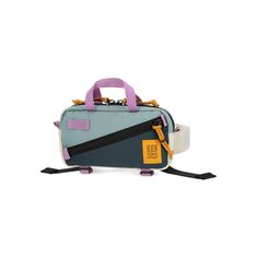 a small blue and purple bag with two straps on the bottom, one strap is attached to it