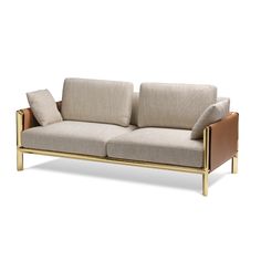 an image of a couch with pillows on the top and bottom, in gold frame