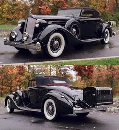 an old black car parked on the side of the road in front of some trees