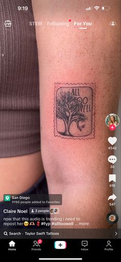 a small tattoo on the arm that says all you need is love and a tree