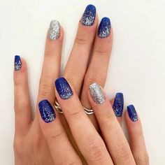 Wedding Nails With Navy Blue Dress, Blue N Silver Nails, Dark Blue Winter Nails Snowflakes, Blue Sparkly Nail Designs, Royal Blue Silver Nails, Dark Blue Silver Nails, Silver And Navy Nails, Navy Blue Nails With Design, Blue And Silver Nails Acrylic