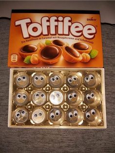 a box of toffee is sitting on the floor