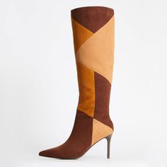 Step out in style with these brown vegan suede patchwork knee-high boots. Featuring a pointed toe and stiletto heel, they effortlessly blend fashion and sustainability for a chic look. Color: Brown Heel Type: Stiletto heel Heel height: 3.54" / 90 mm approx Product measurements were taken using size 8. Please note that measurements may vary by size. Toe: Pointed toe Stylish color block patchwork upper. Handcrafted US sizing. Fits true to size. Brown High Heel Knee-high Boots For Work, Brown Knee-high Boots With Pointed Toe, Brown Suede Pointed Toe Heeled Boots, Fitted Brown Suede Knee-high Boots, Brown Suede Heeled Boots For Party, Brown Suede Knee-high Boots With Pointed Toe, Clear Heel Boots, Suede Patchwork, Cowboy Shoes