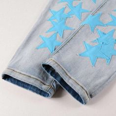 Introducing the 2023 Spring-Summer Collection's Blue Stars Embroidery Men's Jeans! This unique pair of denim jeans will make you feel like it's the turn of the millennium all over again with its everlasting Y2K style. These mid-waist jeans feature a zipper and button closure. stretchy fabric. and stylish embroidered blue stars for a look that's sure to turn heads.Why It's A Must-HaveVogue never gets old only more chic! Y2K style is back in a big way. and this pair of jeans is your ticket to the Summer Star Print Straight Leg Jeans, Blue Star Print Jeans For Summer, Blue Star Print Jeans For Spring, Blue Jeans With Star Print For Summer, Trendy Blue Jeans With Star Patch, Blue Jeans With Star Print For Spring, Summer Star Print Denim Jeans, Spring Blue Jeans With Star Print, Summer Blue Jeans With Star Print