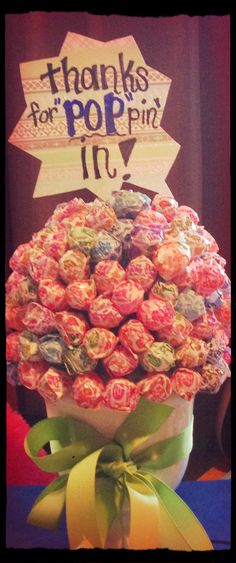 a large bouquet of candy wrapped in paper