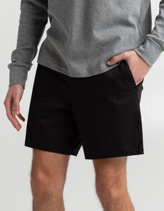 Rsq Shorter Chino Shorts. Very Well Above Knee. Slant Hand Pockets. Zip Fly. Button Waist. Dual Back Welt Pockets With Rsq Logo Flag. 68% Cotton 30% Repreve Recycled Polyester 2% Spandex. Machine Wash. Imported. Black Cotton Bottoms With Button Closure, Casual Black Bottoms With Button Closure, Casual Shorts With 5-inch Inseam For Spring, Casual Spring Shorts With 5-inch Inseam, Fitted Casual Shorts, Casual 5-inch Inseam Shorts For Spring, Casual Bermuda Shorts With 5-inch Inseam And Pockets, Casual Work Pants With Short Inseam, Relaxed Fit Flat Front Bottoms For Summer