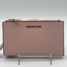 Brand New With Tag Michael Kors Large Double Zip Wallet Wristlet Color: Light Pink Michael Kors, The Signature Logo Jet Set Double Zip Wristlet Features: Zip Closure Interior: 2 Top Zip Pockets Exterior: 6 Credit Card Pockets, 1 Window Pocket, 1 Phone Pocket, 3 Slip Pockets Fits Up To Iphone 7+ - 8+ Approx. 7.25" W 4' H X 1.5" D Michael Kors Clutch Wallet With Card Slots, Everyday Michael Kors Rectangular Clutch, Michael Kors Rectangular Everyday Clutch, Michael Kors Clutch With Zipper Closure, Michael Kors Clutch Wallet With Removable Pouch, Michael Kors Rectangular Clutch For Travel, Michael Kors Phone Case, Mk Wallet, Gold Wallet