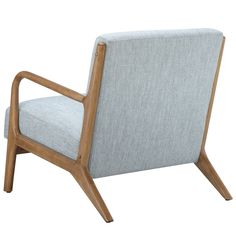 a light blue upholstered chair with wooden legs and arm rests on an isolated white background