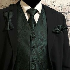 100% Brand new  Men's  Waistcoat Vest & Matching Neck tie & Bow tie and Matching Hanky (4pc Set) Neck tie is not Pre-tied or clip on style, its self tie style Bow Tie is Pre-tied adjustable up to 19.5" Material: 100% Microfiber Two front pocket is for decoration only.  Pocket Square Handkerchief is about: 10" x 10" The Back of the vest is BLACK color. All Vests have an adjustable belted back for a perfect fit. Actual color may differ from the computer monitor display. Elegant Formal Vest With Ties, Classic Formal Vest With Ties, Elegant Green Vest For Formal Occasions, Elegant Green Formal Vest, Classic Green Formal Vest, Classic Fitted Vest With Ties, Elegant Fitted Winter Tie, Classic Fitted Sets With Ties, Green Tux