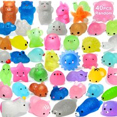 various colored plastic fish and sea creatures on a white background with the words 40 pcs random