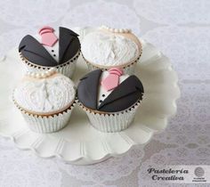 three cupcakes decorated to look like groom and bride's suits