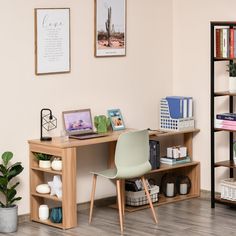 a room with a desk, chair and bookshelf