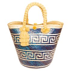 Mawisa bag is part of our San Jacinto Collection. This bag is beautifully handcrafted in San Jacinto Bolívar, Colombia, 120K from Cartagena. The artisans handcraft this colorful bag using Caña Flecha or Palm Straw to create the most perfect and eye-catching statement piece. It is the perfect bag for everyday use or for a special occasion. It will surely make a lasting impression. It is 100% handcrafted. SIZE CHART Blue Woven Top Handle Bag, Blue Woven Top Handle Shoulder Bag, Artisan Blue Tote Bag, Blue Handwoven Top Handle Bag, Blue Handwoven Beach Bag For Market, Blue Handwoven Beach Bag, Traditional Blue Shoulder Bag For Daily Use, Bohemian Blue Bucket Beach Bag, Blue Beach Tote Bag