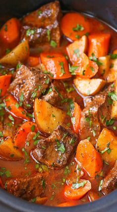 beef stew with carrots and potatoes in a slow cooker