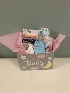 a baby's gift box with its contents in it