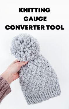 a hand holding up a knitted hat with the text knitting gauge converter tool