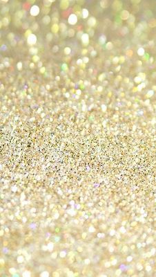 a close up view of some glitter on the ground