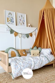 a child's bedroom with a canopy bed and teddy bears