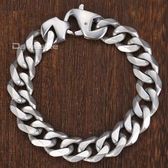 REMARKABLE 15MM STAINLESS STEEL MEN'S CUBAN LINK BRACELET. AN EVEN BETTER DISCOUNT. Interested in our 15mm Stainless Steel Men's Cuban Link Bracelet? Well, great minds think alike, because our team is holding an exclusive 31% off on the 15mm Stainless Steel Men's Cuban Link Bracelet today! Choose from our popular sellers such as Matte Polished Men's Cuban Link Bracelet -- all priced at just US $15.94! This offer won't last long, so ADD TO CART now to save US $23.91! 15MM STAINLESS STEEL MEN'S CU Luxury Stainless Steel Cuban Link Bracelet, Luxury Men's Bracelet With Curb Chain, Polished Man, Boy Cut, Hip Hop Jewelry, Cuban Link Chain, Cuban Chain, Cuban Link, Metal Bracelets