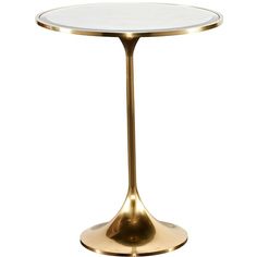 a gold table with a glass top on a white background