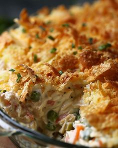 a casserole dish with meat and vegetables in it, ready to be eaten