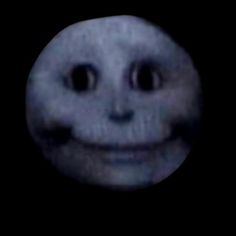 an image of a creepy face in the dark with only one eye open and no teeth