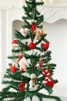 a christmas tree with ornaments hanging from it