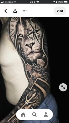 a man's arm with a lion and clock tattoo on it