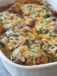 a casserole dish filled with meat and cheese