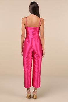 Get ready to become an overnight style icon in the Lulus Contemporary Pose Hot Pink Taffeta Bustier Sleeveless Jumpsuit! Crisp woven taffeta, with a subtle sheen throughout, shapes adjustable spaghetti straps that support a bustier-style bodice with seamed cups and a high, fitted waist. Straight legs boast seamed detailing as they fall to ankle-length hems. Hidden zipper/clasp at back. Fit: This garment fits true to size. Length: Ankle length. Size medium measures 47.5" from adjustable straps to Bustier Jumpsuit, Jumpsuit For Wedding Guest, Adhesive Bra, Sleeveless Jumpsuits, Strapless Bra, Style Icon, Hidden Zipper, Ankle Length, Spaghetti Strap