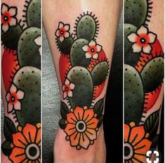 this is an image of a cactus and flowers tattoo on the arm or leg, done by me