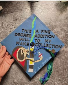 a blue graduation cap that says, this a fine degree addition will to my make collection