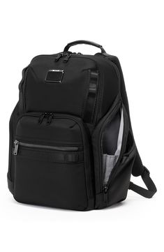 Modern and versatile, this spacious backpack outfitted with plenty of pockets is made from ballistic nylon for lasting durability. Top carry handle; adjustable backpack straps Padded compartment fits most 15" laptops Key leash Luggage sleeve This bag includes Tumi Tracer®, an exclusive, complimentary program that helps reunite lost or stolen bags with their rightful owners using a one-of-a-kind 20-digit number affixed to the bag Ballistic nylon with synthetic and leather trim Imported Daisy Chains, Backpack Outfit, Best Mothers Day Gifts, Daisy Chain, Backpack Straps, Laptop Pocket, Black Backpack, Pen Holders, Luggage Tags