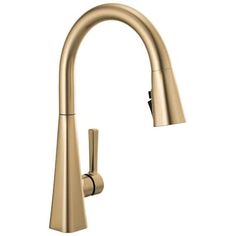 a kitchen faucet with the pull out sprayer in brushed brass finish, on a white background