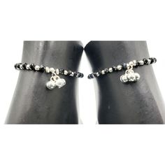 "Description 925 Sterling Silver Stretchable Black Bead Anklet (92.5% Silver purity) available in four lengths from from 4.5 inch (0-12 month) ,5.5 inch (1-3 Years) 6.5 inch (4-9 Years) & 7.5 inch (10-12 Years)and suitable for daily use. Makes low bell / charms sound \"chann-chann-chann\", weaved with NYLON Flexible elastic WIRES and stretchable . SOLD IN PAIRS. Dimensions Anklet Weight: ~8.0-12.0 grams / pair. 1 Pair 4.5-inch + 0.5 inch (nylon stretchable Extension) Anklet: ~8.0-9.0 grams ( Black Anklets With Round Beads For Gift, Adjustable Black Anklet With Tiny Beads, Traditional Black Beaded Bracelets With Tiny Beads, Elegant Black Beaded Anklets, Bead Anklet, Bell Sound, Beautiful Anklet, Chandler Az, Beaded Anklets