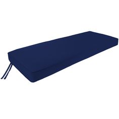 a blue bench cushion with tassels on the back and sides, isolated against a white background