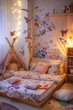 a child's bedroom decorated in pink, purple and white with butterflies on the wall