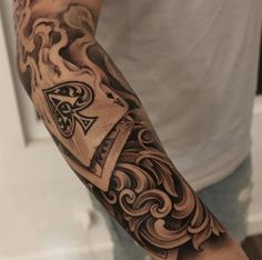 a man with a tattoo on his arm