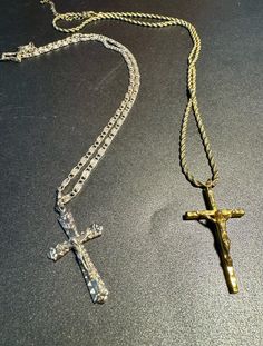 You will love these exquisite crucifix necklaces.  The necklaces are constructed in my shop by me, with one being silver plated metal and the other a rope gold plated chain. The gold necklace has a two inch gold crucifix & the silver also has a two inch decorative silver plated crucifix made in Italy. Very heavy-duty & durable necklaces. *The gold necklace measures approximately 24 inches long. *The silver necklace measures approximately 22 inches long. Materials used (silver) - 22 inch chrome plated decorative chain - Silver plated 2 inch crucifix Materials used (gold) - 24 inch gold plated rope chain with extension - Gold plated 2 inch crucifix *If you would like a different Crucifix, centerpiece or medal added please don't hesitate to ask and I would be happy to accommodate you. *Made i Cheap Adjustable Crucifix Necklace, Crucifix Necklace, Wedding Jewellery Necklace, Gold Plated Chains, Rope Chain, Wedding Necklace, Chrome Plating, Silver Chain, Necklace Etsy