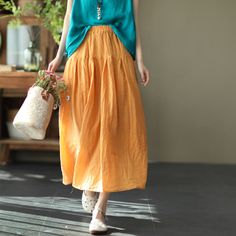 Gender: Women Item Type: Long Skirt Material: 70% Linen 30% Cotton Season: Summer Style: Casual, Loose Waist Type: Natural & Elastic Waist One Size Length: 86 cm/ 20.08 " Waist: 66- 102 cm/ 27.56- 39.37 " Spring Baggy Lined Maxi Skirt, Spring Baggy Gathered Skirt, Baggy Maxi Skirt For Summer, Orange Tiered Skirt For Spring, Baggy Pleated Maxi Skirt, Orange Flared Skirt For Spring, Spring Orange Skirt With Elastic Waistband, Spring Orange Relaxed Fit Skirt, Spring Orange Relaxed Skirt