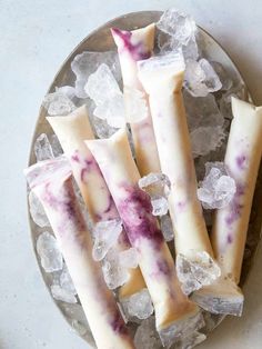 several pieces of food sitting on top of ice